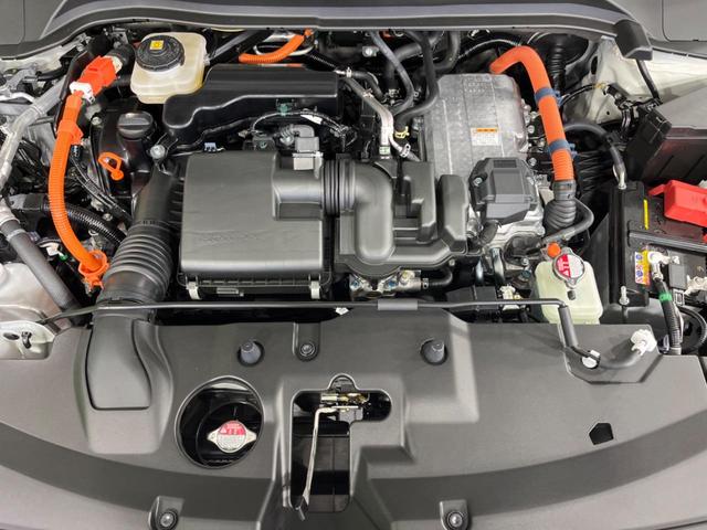 e:HEV Z 登録済未使用車 ホンダセンシング アダプティブクルーズコントロール LEDヘッド シーケンシャルターンランプ 革巻きステアリング ステアリングヒーター ハンズフリーパワーバックドア 前席シートヒーター(19枚目)