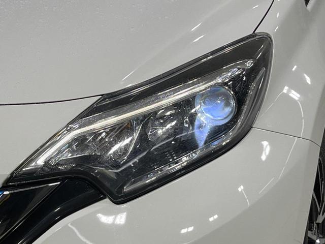 ノート ｅ－パワー　Ｘ　禁煙車　エマージェンシーブレーキ　車線逸脱警報　純正ナビ　全周囲カメラ　ＬＥＤヘッド　オートライト　ステアリングスイッチ　オートエアコン　ＥＴＣ　盗難防止装置　プライバシーガラス　横滑防止装置（13枚目）