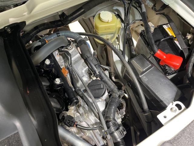 ハイゼットカーゴ クルーズ　禁煙車　５ＭＴ　純正オーディオ　キーレスエントリー　電動格納ミラー（21枚目）