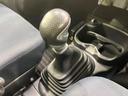 エッセ D 禁煙車 5MT HIDヘッドライト ETC オーディオ 純正13インチホイール CD再生 革巻きステアリング 中古車画像_4