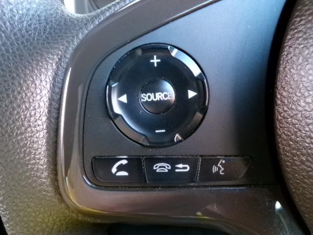 Ｎ－ＷＧＮ Ｌホンダセンシング　４ＷＤ　ギャザズナビＴＶ　ＤＶＤ　ＣＤ　Ｂｌｕｅｔｏｏｔｈ　バックカメラ　アイドリングストップ　横滑り防止付き　ＥＴＣ　プライバシーガラス　クルーズコントロール　シートヒーター　パーキングセンサー　１４インチアルミホイール　電動パーキング（21枚目）
