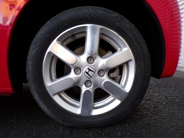 Ｎ－ＷＧＮ Ｌホンダセンシング　４ＷＤ　ギャザズナビＴＶ　ＤＶＤ　ＣＤ　Ｂｌｕｅｔｏｏｔｈ　バックカメラ　アイドリングストップ　横滑り防止付き　ＥＴＣ　プライバシーガラス　クルーズコントロール　シートヒーター　パーキングセンサー　１４インチアルミホイール　電動パーキング（31枚目）