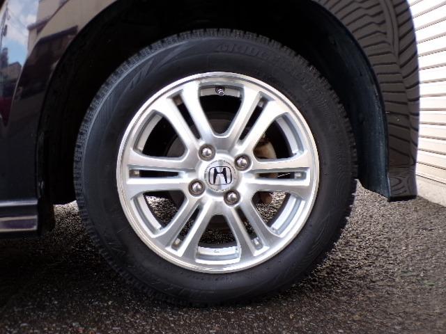 N-BOXカスタム G・Lパッケージ パワースライドドア ギャザズCDステレオ CVT ディスチャージヘッドライト ウィンカーミラー アイドリングストップ ETC 横滑り防止付き オートライト プライバシーガラス 電動格納式ドアミラー ステアリングスイッチ プッシュスタート(24枚目)