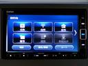 Ｎ－ＷＧＮ Ｌホンダセンシング　４ＷＤ　ギャザズナビＴＶ　ＤＶＤ　ＣＤ　Ｂｌｕｅｔｏｏｔｈ　バックカメラ　アイドリングストップ　横滑り防止付き　ＥＴＣ　プライバシーガラス　クルーズコントロール　シートヒーター　パーキングセンサー　１４インチアルミホイール　電動パーキング（8枚目）