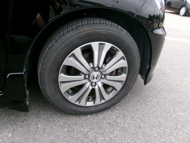 フリードスパイクハイブリッド ジャストセレクション＋　メモリーナビＴＶ　バックカメラ　ディスチャージヘッドライト　左側パワースライドドア　純正１５インチアルミホイル　オートクルーズコントロール　ＥＴＣ車載器　スマートキー（19枚目）