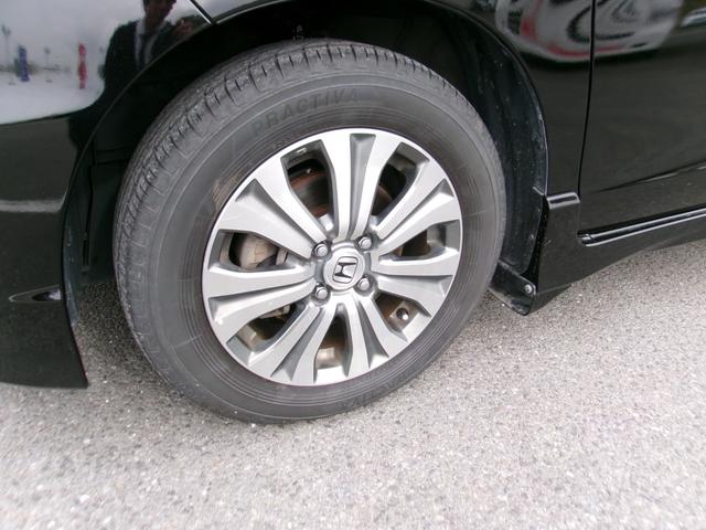 フリードスパイクハイブリッド ジャストセレクション＋　メモリーナビＴＶ　バックカメラ　ディスチャージヘッドライト　左側パワースライドドア　純正１５インチアルミホイル　オートクルーズコントロール　ＥＴＣ車載器　スマートキー（20枚目）