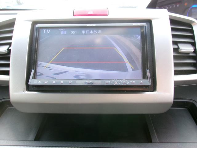 フリードハイブリッド ジャストセレクション　メモリーナビＴＶ　バックカメラ　ディスチャージヘッドライト　両側パワースライドドア　社外１５インチアルミホイル　オートクルーズコントロール　ＥＴＣ車載器　スマートキー（11枚目）