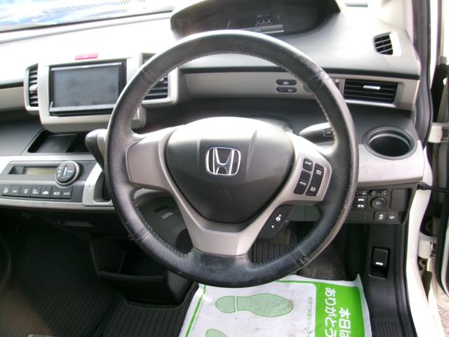 フリードハイブリッド ジャストセレクション　メモリーナビＴＶ　バックカメラ　ディスチャージヘッドライト　両側パワースライドドア　社外１５インチアルミホイル　オートクルーズコントロール　ＥＴＣ車載器　スマートキー（15枚目）