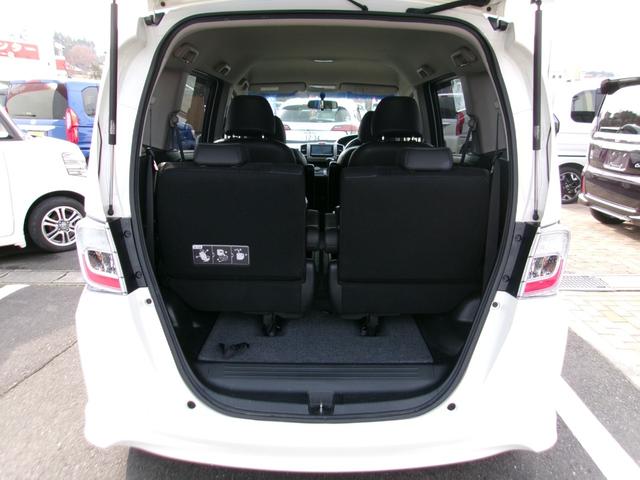 フリードハイブリッド ジャストセレクション　メモリーナビＴＶ　バックカメラ　ディスチャージヘッドライト　両側パワースライドドア　社外１５インチアルミホイル　オートクルーズコントロール　ＥＴＣ車載器　スマートキー（18枚目）