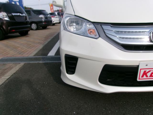 フリードハイブリッド ジャストセレクション　メモリーナビＴＶ　バックカメラ　ディスチャージヘッドライト　両側パワースライドドア　社外１５インチアルミホイル　オートクルーズコントロール　ＥＴＣ車載器　スマートキー（26枚目）