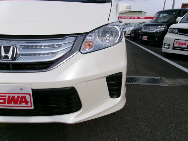 フリードハイブリッド ジャストセレクション　メモリーナビＴＶ　バックカメラ　ディスチャージヘッドライト　両側パワースライドドア　社外１５インチアルミホイル　オートクルーズコントロール　ＥＴＣ車載器　スマートキー（27枚目）