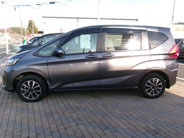 フリードハイブリッド ハイブリッド・Ｇ　メモリーナビＴＶ　バックカメラ　ＬＥＤヘッドライト　左側パワースライドドア　純正１５インチアルミホイル　オートクルーズコントロール　ＥＴＣ車載器　スマートキー　４ＷＤ（2枚目）