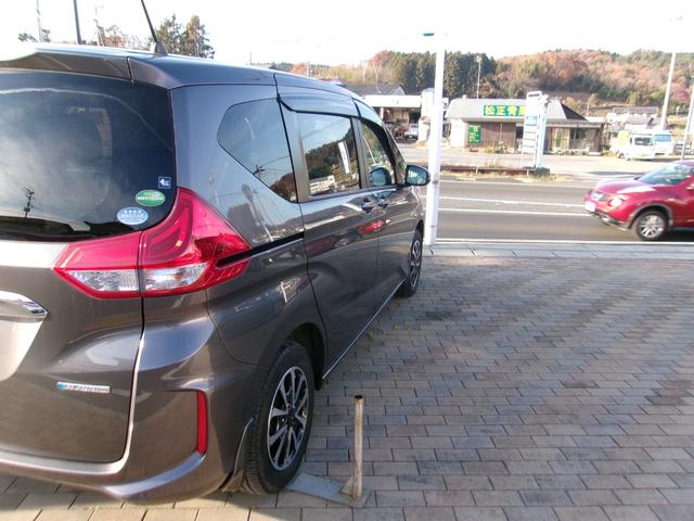 フリードハイブリッド ハイブリッド・Ｇ　メモリーナビＴＶ　バックカメラ　ＬＥＤヘッドライト　左側パワースライドドア　純正１５インチアルミホイル　オートクルーズコントロール　ＥＴＣ車載器　スマートキー　４ＷＤ（4枚目）