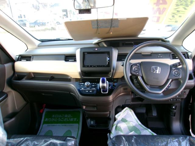 フリードハイブリッド ハイブリッド・Ｇ　メモリーナビＴＶ　バックカメラ　ＬＥＤヘッドライト　左側パワースライドドア　純正１５インチアルミホイル　オートクルーズコントロール　ＥＴＣ車載器　スマートキー　４ＷＤ（9枚目）