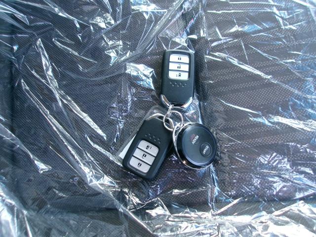 フリードハイブリッド ハイブリッド・Ｇ　メモリーナビＴＶ　バックカメラ　ＬＥＤヘッドライト　左側パワースライドドア　純正１５インチアルミホイル　オートクルーズコントロール　ＥＴＣ車載器　スマートキー　４ＷＤ（19枚目）