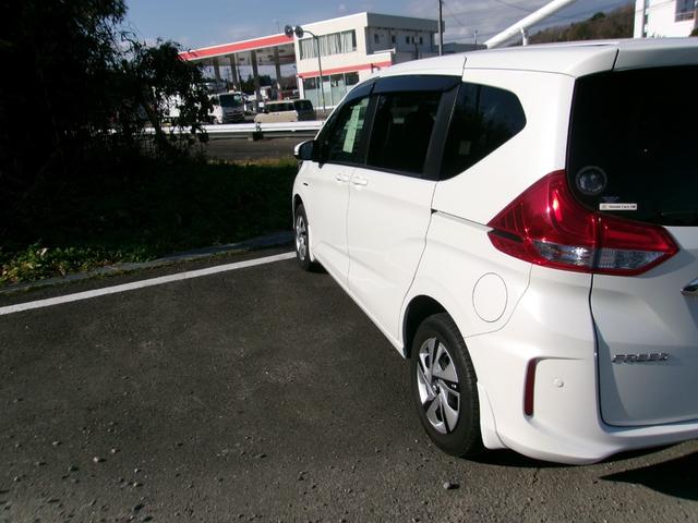 フリードハイブリッド ハイブリッド・Gホンダセンシング メモリーナビTV バックカメラ LEDヘッドライト 両側パワースライドドア オートクルーズコントロール ETC車載器 スマートキー 4WD(3枚目)