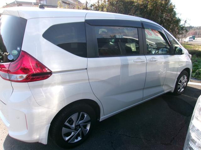 フリードハイブリッド ハイブリッド・Gホンダセンシング メモリーナビTV バックカメラ LEDヘッドライト 両側パワースライドドア オートクルーズコントロール ETC車載器 スマートキー 4WD(5枚目)