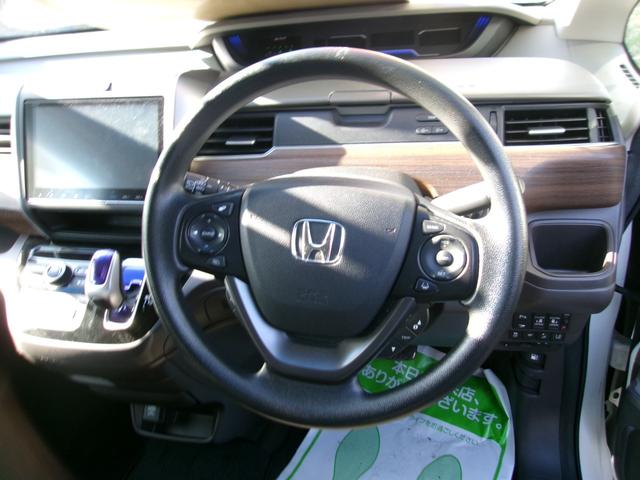 フリードハイブリッド ハイブリッド・Gホンダセンシング メモリーナビTV バックカメラ LEDヘッドライト 両側パワースライドドア オートクルーズコントロール ETC車載器 スマートキー 4WD(14枚目)