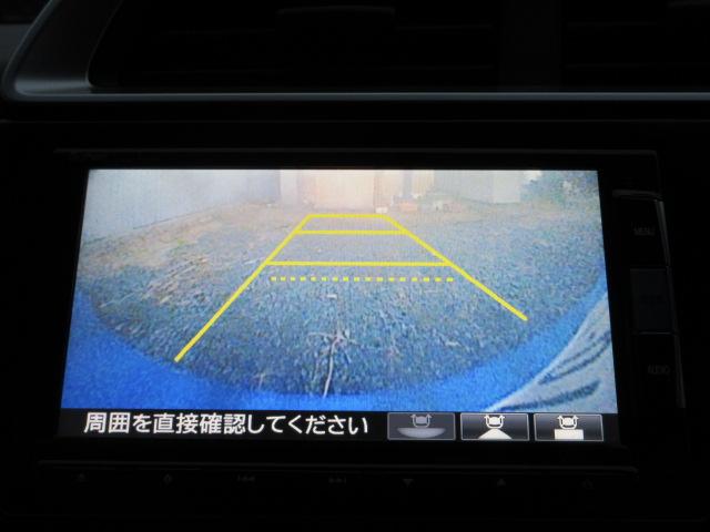 フィットハイブリッド Ｆパッケージ　４ＷＤ　寒冷地仕様　禁煙車　社外ＳＤナビＴＶ　フルセグＴＶ　　バックカメラ　ＥＴＣ　プッシュスタート　スマートキー　ＢＴ接続　ＣＤ・ＤＶＤ再生　ワイパーデアイサー　ミュージックサーバー　ＡＭ・ＦＭ（3枚目）