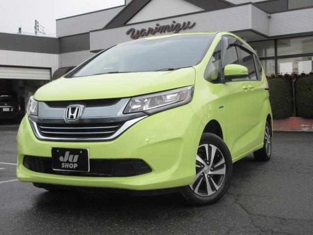 フリードハイブリッド ハイブリッド・Ｇホンダセンシング　４ＷＤ　ナビ　フルセグＴＶ　Ｂｌｕｅｔｏｏｔｈ　ＣＤ＆ＤＶＤ再生　バックカメラ　両側パワースライドドア　ドラレコ　ＬＥＤヘッドランプ　フロントワイパーデアイサー　ビルトインＥＴＣ　ドラレコ　クルコン（2枚目）