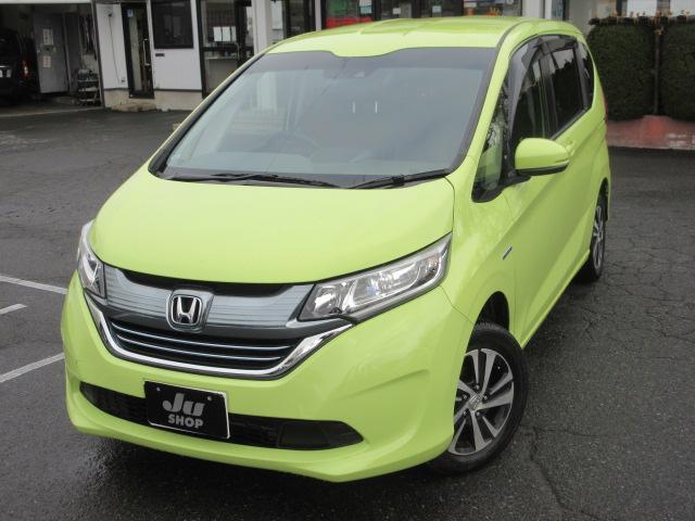 フリードハイブリッド ハイブリッド・Ｇホンダセンシング　４ＷＤ　ナビ　フルセグＴＶ　Ｂｌｕｅｔｏｏｔｈ　ＣＤ＆ＤＶＤ再生　バックカメラ　両側パワースライドドア　ドラレコ　ＬＥＤヘッドランプ　フロントワイパーデアイサー　ビルトインＥＴＣ　ドラレコ　クルコン（3枚目）