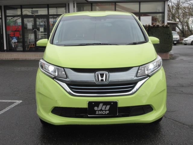 フリードハイブリッド ハイブリッド・Ｇホンダセンシング　４ＷＤ　ナビ　フルセグＴＶ　Ｂｌｕｅｔｏｏｔｈ　ＣＤ＆ＤＶＤ再生　バックカメラ　両側パワースライドドア　ドラレコ　ＬＥＤヘッドランプ　フロントワイパーデアイサー　ビルトインＥＴＣ　ドラレコ　クルコン（4枚目）