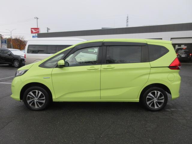 フリードハイブリッド ハイブリッド・Ｇホンダセンシング　４ＷＤ　ナビ　フルセグＴＶ　Ｂｌｕｅｔｏｏｔｈ　ＣＤ＆ＤＶＤ再生　バックカメラ　両側パワースライドドア　ドラレコ　ＬＥＤヘッドランプ　フロントワイパーデアイサー　ビルトインＥＴＣ　ドラレコ　クルコン（8枚目）