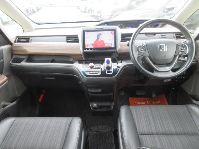 フリードハイブリッド ハイブリッド・Ｇホンダセンシング　４ＷＤ　ナビ　フルセグＴＶ　Ｂｌｕｅｔｏｏｔｈ　ＣＤ＆ＤＶＤ再生　バックカメラ　両側パワースライドドア　ドラレコ　ＬＥＤヘッドランプ　フロントワイパーデアイサー　ビルトインＥＴＣ　ドラレコ　クルコン（14枚目）