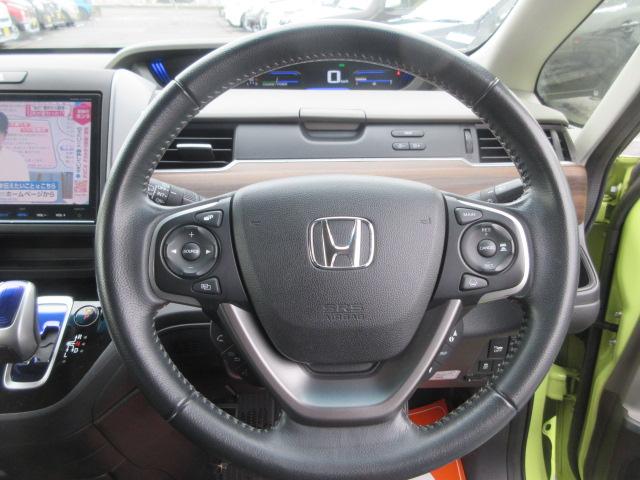 フリードハイブリッド ハイブリッド・Ｇホンダセンシング　４ＷＤ　ナビ　フルセグＴＶ　Ｂｌｕｅｔｏｏｔｈ　ＣＤ＆ＤＶＤ再生　バックカメラ　両側パワースライドドア　ドラレコ　ＬＥＤヘッドランプ　フロントワイパーデアイサー　ビルトインＥＴＣ　ドラレコ　クルコン（15枚目）