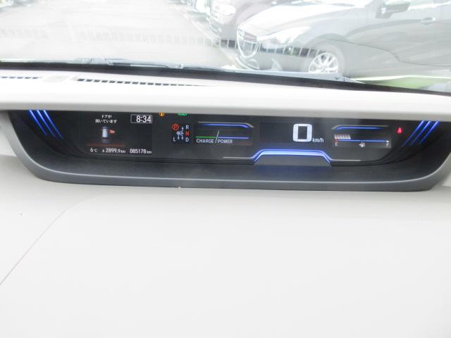 フリードハイブリッド ハイブリッド・Ｇホンダセンシング　４ＷＤ　ナビ　フルセグＴＶ　Ｂｌｕｅｔｏｏｔｈ　ＣＤ＆ＤＶＤ再生　バックカメラ　両側パワースライドドア　ドラレコ　ＬＥＤヘッドランプ　フロントワイパーデアイサー　ビルトインＥＴＣ　ドラレコ　クルコン（23枚目）