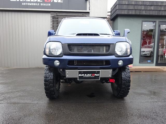 ジムニー ＸＣ　リフトＵＰ　ヨコハマジオランダーＸ－ＭＴ　ＦＡＲＭアルミ　ハイブリッジファーストリーディングアーム　Ｋ－プロダクツ減衰調整ショックサスペンション　調整式ラテラルロッド　社外マフラーバンパーリアスポイラ（2枚目）