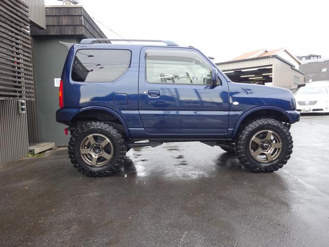 ジムニー ＸＣ　リフトＵＰ　ヨコハマジオランダーＸ－ＭＴ　ＦＡＲＭアルミ　ハイブリッジファーストリーディングアーム　Ｋ－プロダクツ減衰調整ショックサスペンション　調整式ラテラルロッド　社外マフラーバンパーリアスポイラ（4枚目）