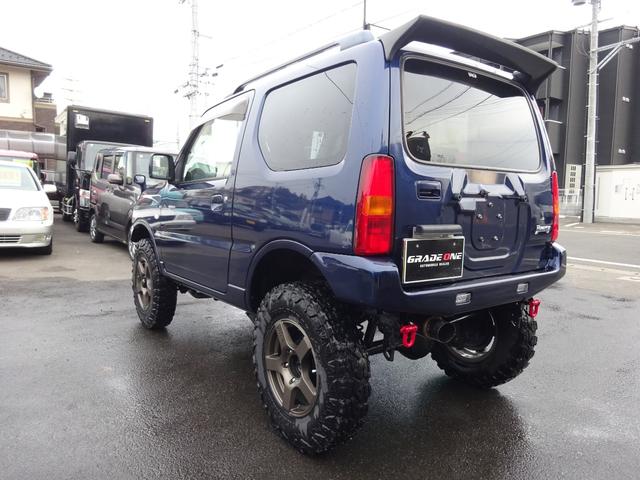 ジムニー ＸＣ　リフトＵＰ　ヨコハマジオランダーＸ－ＭＴ　ＦＡＲＭアルミ　ハイブリッジファーストリーディングアーム　Ｋ－プロダクツ減衰調整ショックサスペンション　調整式ラテラルロッド　社外マフラーバンパーリアスポイラ（7枚目）