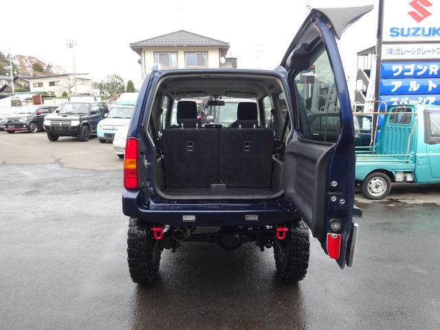 ジムニー ＸＣ　リフトＵＰ　ヨコハマジオランダーＸ－ＭＴ　ＦＡＲＭアルミ　ハイブリッジファーストリーディングアーム　Ｋ－プロダクツ減衰調整ショックサスペンション　調整式ラテラルロッド　社外マフラーバンパーリアスポイラ（10枚目）