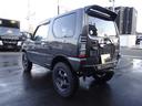 ジムニー クロスアドベンチャー 社外F/Rショートバンパー 社外スキッドプレート 社外マフラー YOKOHAMAジオランダーM/Tタイヤ 社外16インチアルミ 社外LEDテール 社外リアスポイラー キーレス シートヒーター 5MT(7枚目)