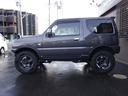 ジムニー クロスアドベンチャー 社外F/Rショートバンパー 社外スキッドプレート 社外マフラー YOKOHAMAジオランダーM/Tタイヤ 社外16インチアルミ 社外LEDテール 社外リアスポイラー キーレス シートヒーター 5MT(8枚目)