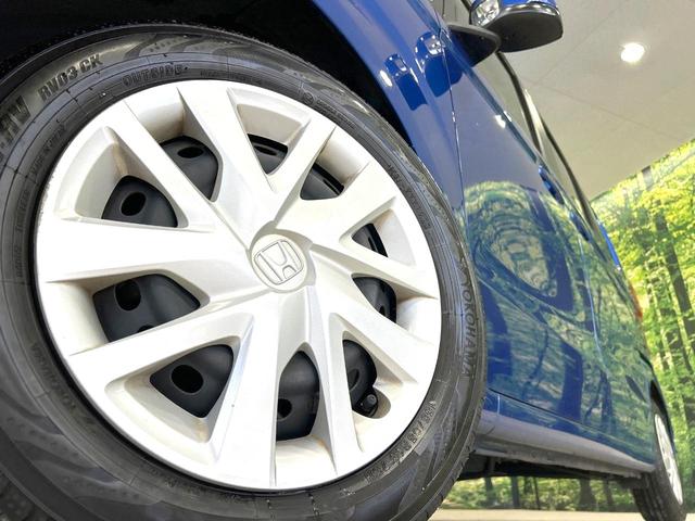 N-BOX G・Lホンダセンシング 電動スライドドア 純正ナビ バックカメラ 衝突被害軽減装置 アダプティブクルーズ 禁煙車 スマートキー LEDヘッド ETC オートマチックハイビーム オートライト オートエアコン 車線逸脱警報(13枚目)