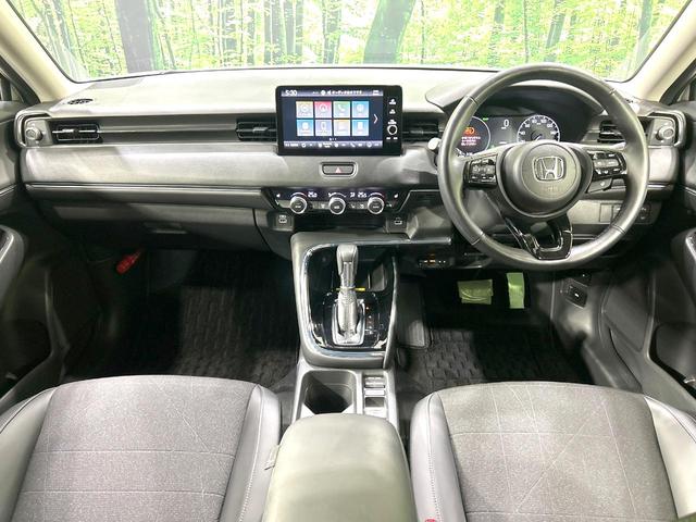 ヴェゼル e:HEV Z 4WD 禁煙車 メーカー9型ナビ バックカメラ 寒冷地仕様 衝突軽減装置 アダプティブクルーズ 電動リアゲート ハーフレザーシート ドラレコ コーナーセンサー スマートキー LEDヘッド ETC2.0(2枚目)