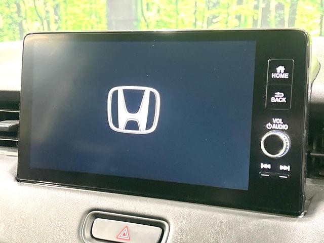 ヴェゼル e:HEV Z 4WD 禁煙車 メーカー9型ナビ バックカメラ 寒冷地仕様 衝突軽減装置 アダプティブクルーズ 電動リアゲート ハーフレザーシート ドラレコ コーナーセンサー スマートキー LEDヘッド ETC2.0(3枚目)