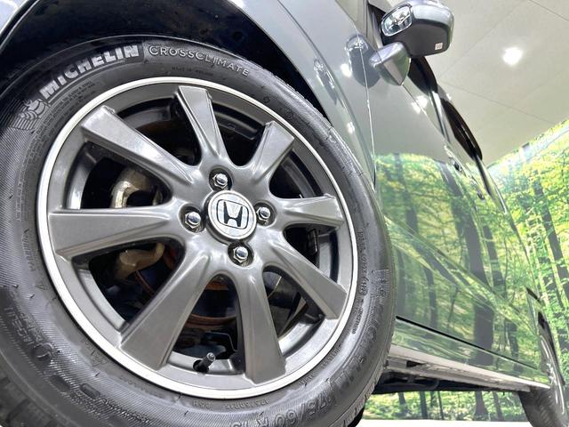 N-BOX モデューロX G・ターボパッケージ 両側電動ドア 9型ナビ バックカメラ 禁煙車 スマートキー HIDヘッド ETC クルコン オートライト オートエアコン 純正15インチアルミ Bluetooth CD DVD再生 フルセグ(13枚目)