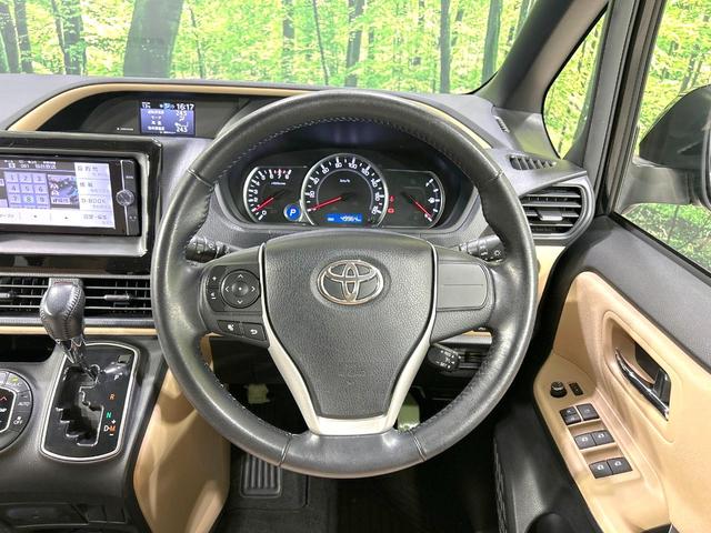 ノア G 禁煙車 純正ナビ バックカメラ 両側電動ドア スマートキー LEDヘッド ETC クルコン オートハイビーム オートライト デュアルエアコン 純正15インチアルミ Bluetooth 革巻きハンドル(12枚目)