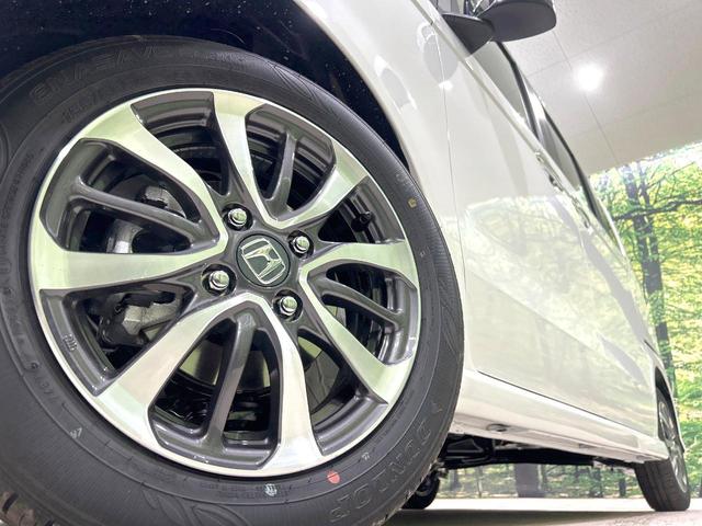 N-BOXカスタム ベースグレード 届出済未使用車 両側電動スライドドア 衝突軽減装置 アダプティブクルーズ シートヒーター スマートキー 純正14インチAW オートライト オートエアコン オートマチックハイビーム 盗難防止装置(13枚目)