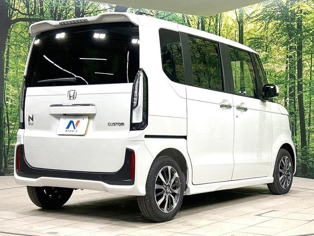 N-BOXカスタム ベースグレード 届出済未使用車 両側電動スライドドア 衝突軽減装置 アダプティブクルーズ シートヒーター スマートキー 純正14インチAW オートライト オートエアコン オートマチックハイビーム 盗難防止装置(17枚目)