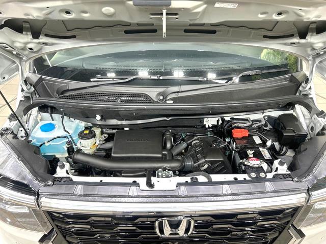N-BOXカスタム ベースグレード 届出済未使用車 両側電動スライドドア 衝突軽減装置 アダプティブクルーズ シートヒーター スマートキー 純正14インチAW オートライト オートエアコン オートマチックハイビーム 盗難防止装置(18枚目)