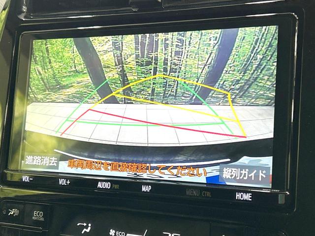 プリウス Ｓツーリングセレクション　後期型　禁煙車　純正９型ナビ　衝突軽減装置　レーダークルーズ　バックカメラ　ＥＴＣ　スマートキー　ＬＥＤヘッド　オートライト　オートエアコン　革巻きステアリング　純正１７インチＡＷ　車線逸脱警報（6枚目）