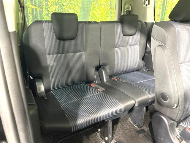 ヴォクシー ZS 禁煙車 純正ナビ 両側電動スライドドア バックカメラ ETC スマートキー LEDヘッド 革巻きステアリング 純正16インチAW オートエアコン オートライト 盗難防止装置 プライバシーガラス(10枚目)