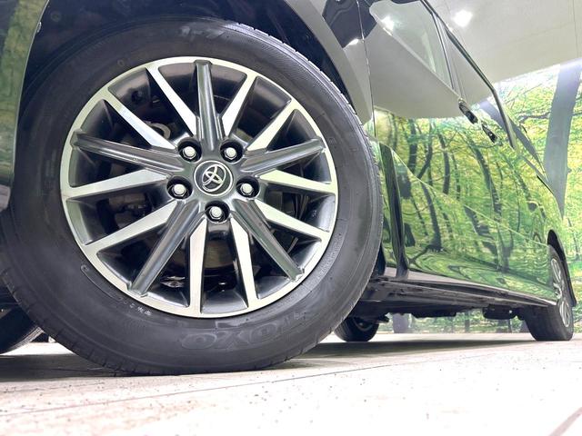 ヴォクシー ZS 禁煙車 純正ナビ 両側電動スライドドア バックカメラ ETC スマートキー LEDヘッド 革巻きステアリング 純正16インチAW オートエアコン オートライト 盗難防止装置 プライバシーガラス(14枚目)