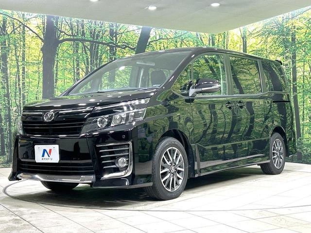 ヴォクシー ZS 禁煙車 純正ナビ 両側電動スライドドア バックカメラ ETC スマートキー LEDヘッド 革巻きステアリング 純正16インチAW オートエアコン オートライト 盗難防止装置 プライバシーガラス(34枚目)