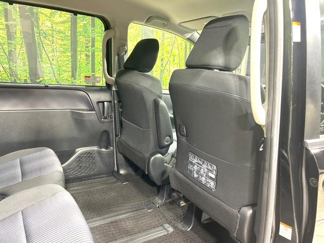 ヴォクシー ZS 禁煙車 純正ナビ 両側電動スライドドア バックカメラ ETC スマートキー LEDヘッド 革巻きステアリング 純正16インチAW オートエアコン オートライト 盗難防止装置 プライバシーガラス(51枚目)