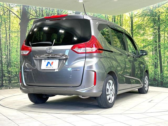 フリードハイブリッド ハイブリッド・Gホンダセンシング 純正9型ナビ 両側電動ドア 後席モニター バックカメラ 寒冷地仕様 衝突被害軽減装置 禁煙車 ドラレコ スマートキー LEDヘッド ETC2.0 オートライト オートエアコン Bluetooth(18枚目)